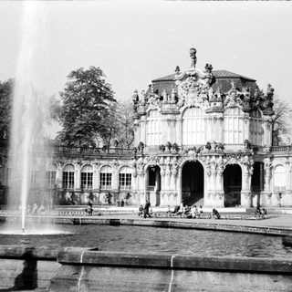 Baroque-style palace with grand fountain.