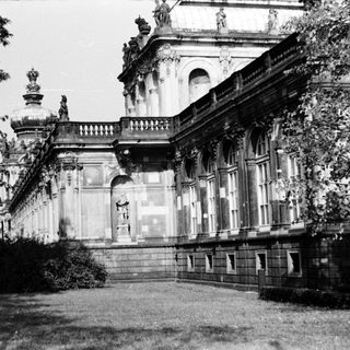 Grand neoclassical building with ornate facade.