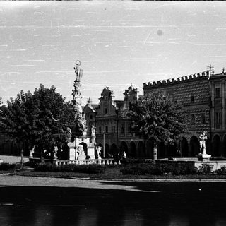 Historic building with statues and ornate architecture.