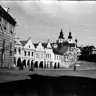 Historic European town square with medieval architecture.