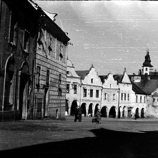 Historic European town square with medieval architecture.