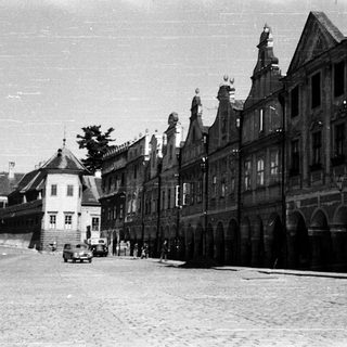 Historic European street with medieval-style buildings.