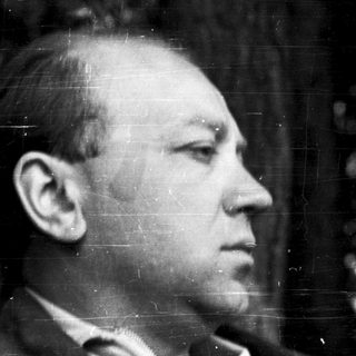 Portrait of a man in profile, black-and-white.