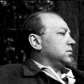 Portrait of a man in profile, black-and-white.