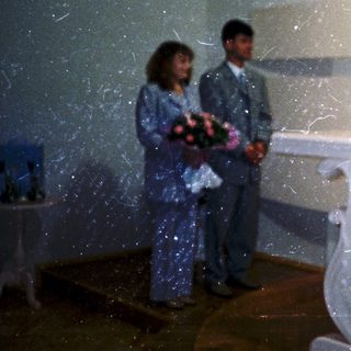 Wedding ceremony with vows exchange at altar.