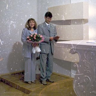 Couple exchanging wedding vows at a modern ceremony.