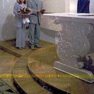 Couple exchanging wedding vows at a modern ceremony.