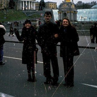 People posing near Independence Monument in Kyiv.