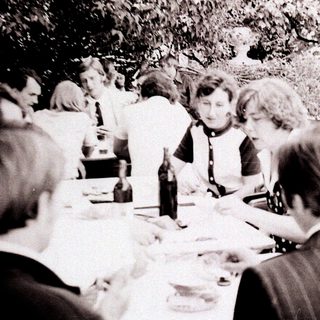 Group gathered for an outdoor meal.