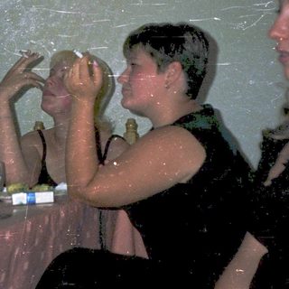 People enjoying a water-filled indoor party.