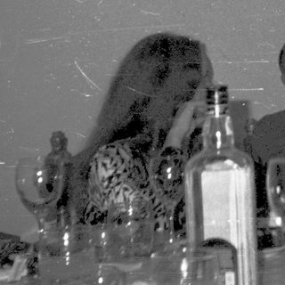 Celebratory gathering with people drinking champagne indoors.
