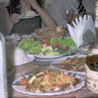 People dining together at a restaurant table.