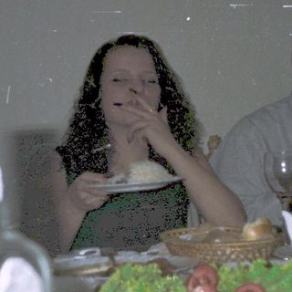 People dining together at a restaurant table.