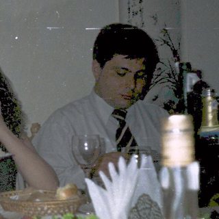 People dining together at a restaurant table.