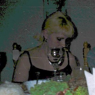 Family dining on diverse meal at festive table.