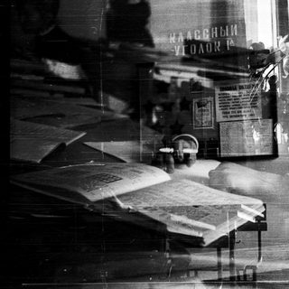 Vintage library or study with books and posters.