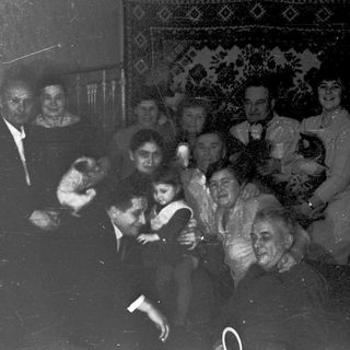 Family group portrait from early 20th century.