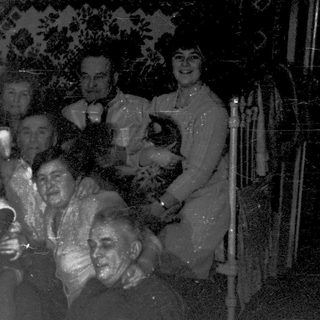 Family group portrait from early 20th century.