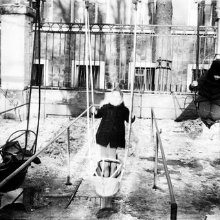 Industrial workers using suspended swing lifts.