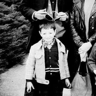 Family portrait outdoors in winter attire.