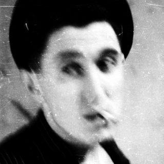 Vintage portrait of a man in formal attire.