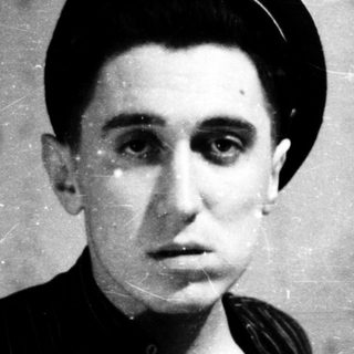 Vintage portrait of a man in early 20th-century attire.