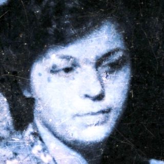 Vintage photograph of a person indoors.