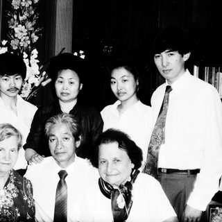 Family group photo from formal event.