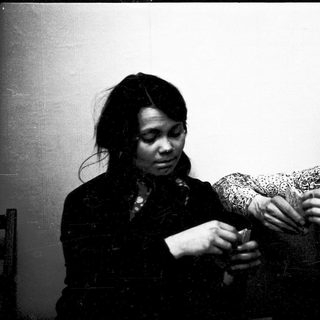 Two people playing video game together.