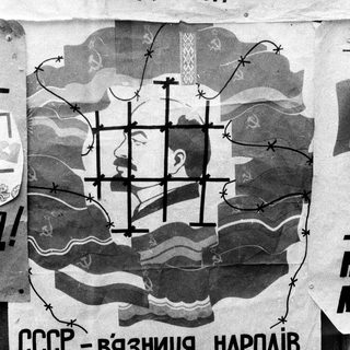 Propaganda poster depicting Lenin behind barbed wire. "Soviet Union as peoples' prison."