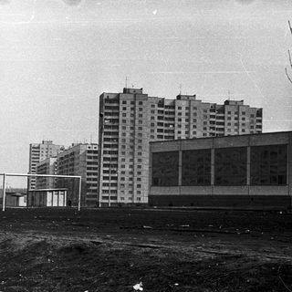 Urban construction site with high-rise apartment buildings.