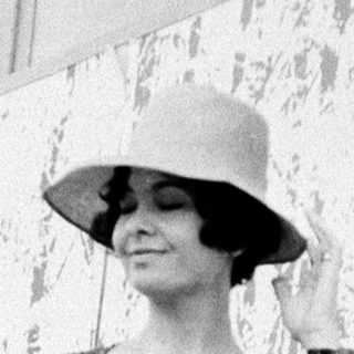 Iconic model Audrey Hepburn in 1950s fashion.