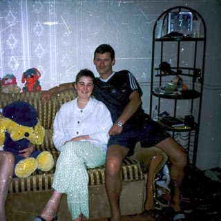 Four people sitting indoors during a bubble party.
