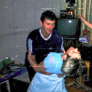 People playing with water indoors during heavy rain.