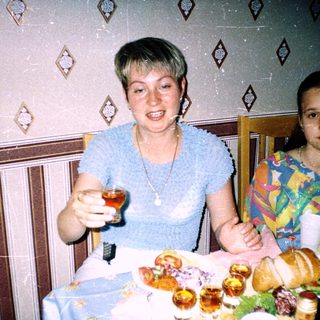 Family celebrating with festive table food.