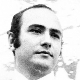 Portrait of a man in formal attire.