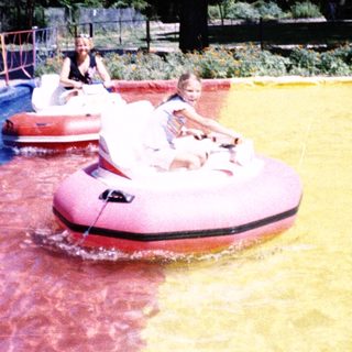 Boat ride on colorful water track.