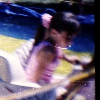 Amusement park bumper cars at night.