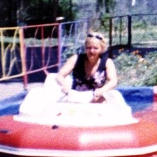Water bumper boats on a colored race track.