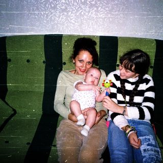 Family with baby on public transport.