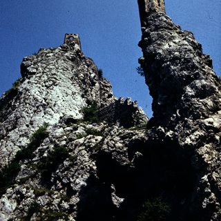 Eroding rock formations resembling medieval towers.