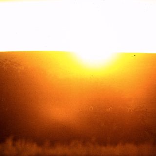 Sunrise or sunset over Martian surface.