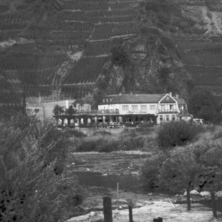 Historic mountain resort with terraced slopes.