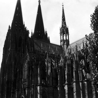Gothic cathedral with tall spires.