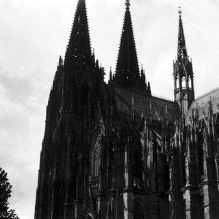 Gothic cathedral with tall spires.