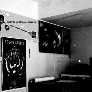 Vintage cinema ticket booth with South Africa film poster.