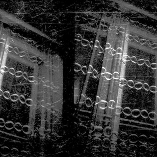 Light reflections on wet glass windows.