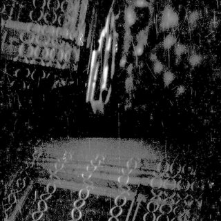 Blurred night scene with light trails and circular reflections.