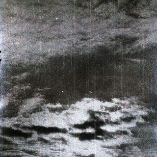 Dramatic clouds under stormy sky.