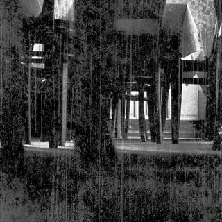 Reflection of modern building columns and ceiling.